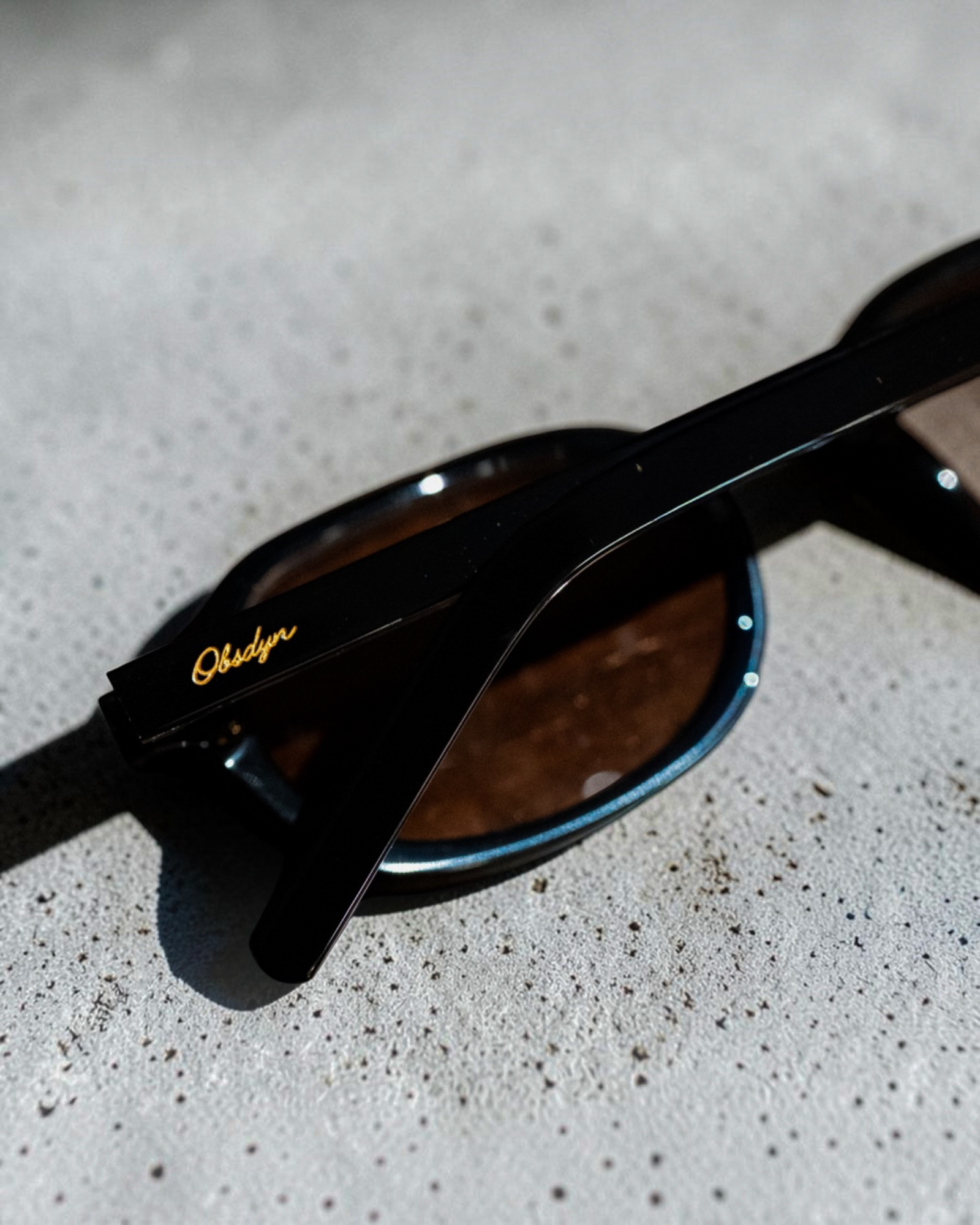 Ember — OBSDYN gold script detail